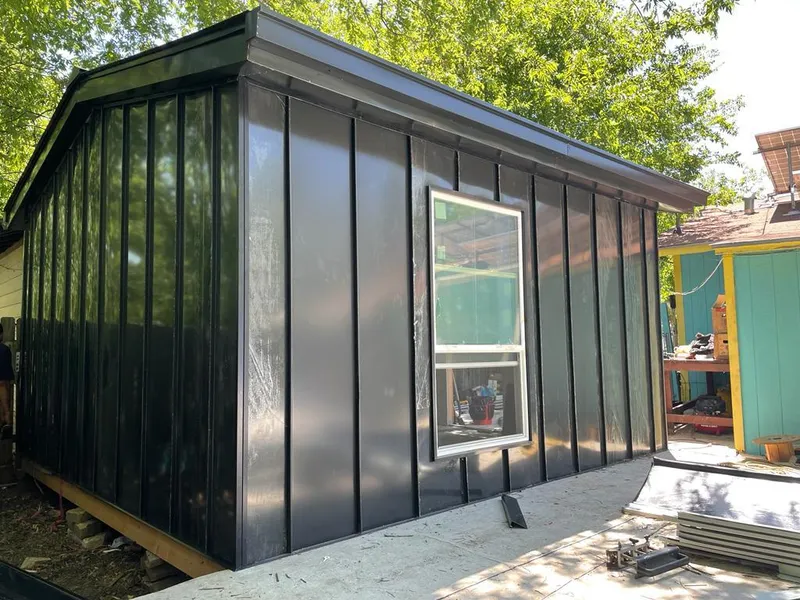 Black standing seam metal wall panels for Metal Roof Installation in Rainbow Springs