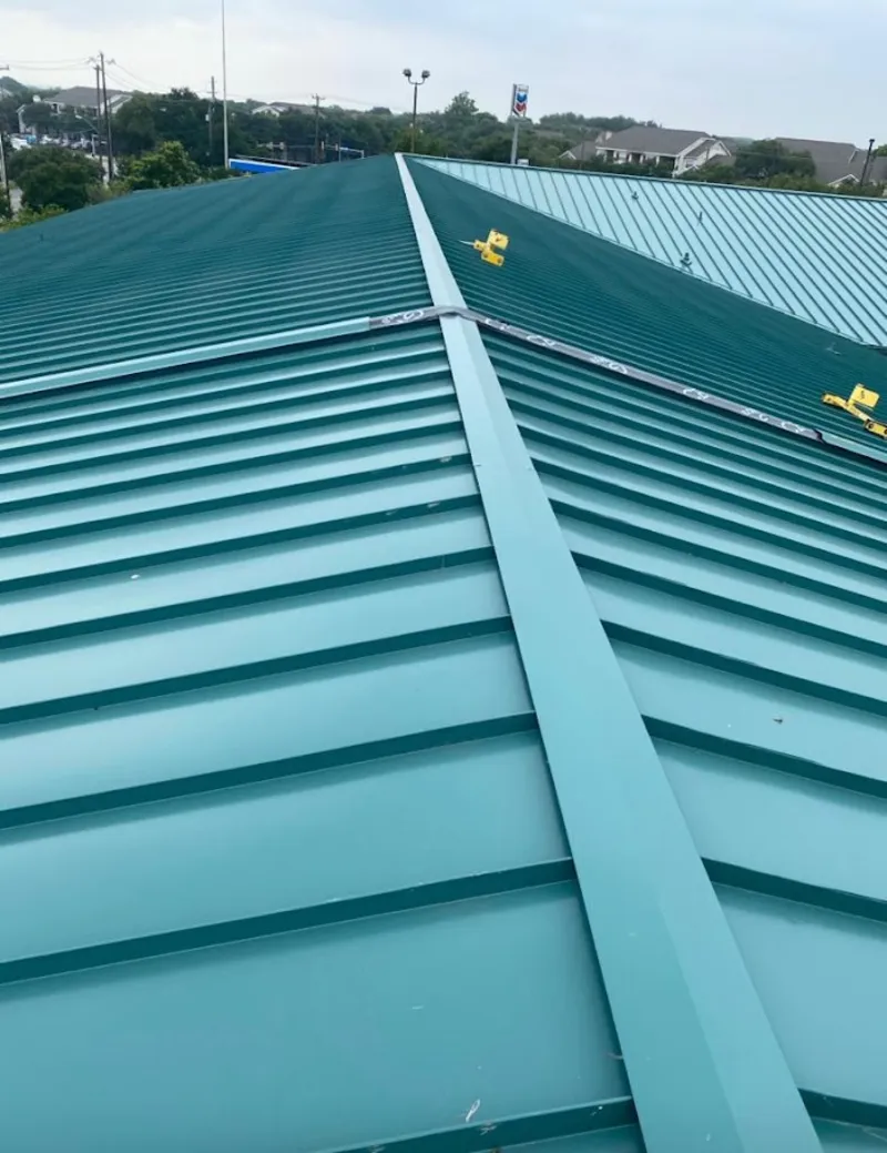 Green commercial metal roof ridge and valley for Metal Roof Repair in Rainbow Springs